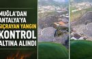 Muğla’dan Antalya’ya sıçrayan yangın kontrol altında! Soğutma çalışmaları sürüyor