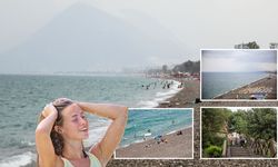 Antalya’da yağmur sürprizi: Sağanak yağışa rağmen denizin keyfini çıkarttılar