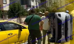 Antalya'da taksi ile çarpışan hafif ticari araç yan yattı!