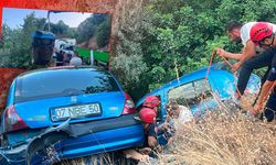 Antalya'da korkutan kaza: Otomobil şarampolde asılı kaldı!