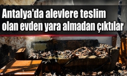 Antalya'da alevlere teslim olan evden yara almadan çıktılar