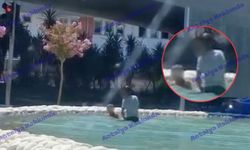 Antalya'da sıcaktan bunalan gençler süs havuzuna girdi!