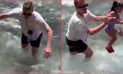 Antalya'da akıntıya kapılan küçük kızı Rus turist kurtardı! İşte o anlar