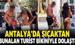 Antalya'da sıcaktan bunalan turist bikiniyle dolaştı! İşte o anlar