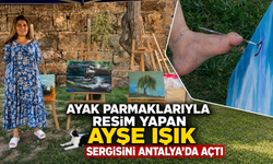Ayak parmaklarıyla resim yapan Ayşe Işık sergisini Antalya'da açtı