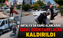 Antalya'da kamu alanlarını işgal eden tabelalar kaldırıldı