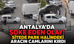 Antalya'da şoke eden olay! Sitede park halindeki aracın camlarını kırdı