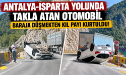 Antalya-Isparta yolunda takla atan otomobil baraja düşmekten kıl payı kurtuldu!