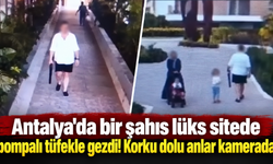 Antalya'da bir şahıs lüks sitede pompalı tüfekle gezdi! Korku dolu anlar kamerada