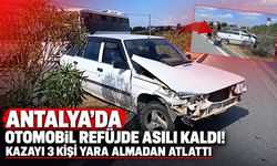 Antalya’da otomobil refüjde asılı kaldı! Kazayı 3 kişi yara almadan atlattı