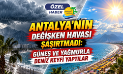 Antalya'nın değişken havası şaşırtmadı: Güneş ve yağmurla deniz keyfi yaptılar