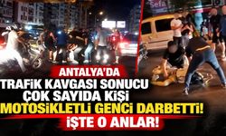 Antalya'da trafik kavgası sonucu çok sayıda kişi motosikletli genci darbetti! İşte o anlar