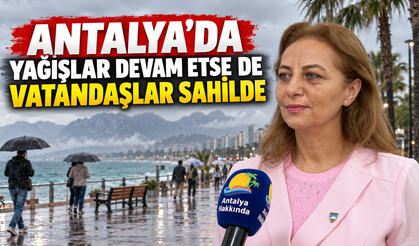 Antalya'da yağışlar devam etse de vatandaşlar sahilde