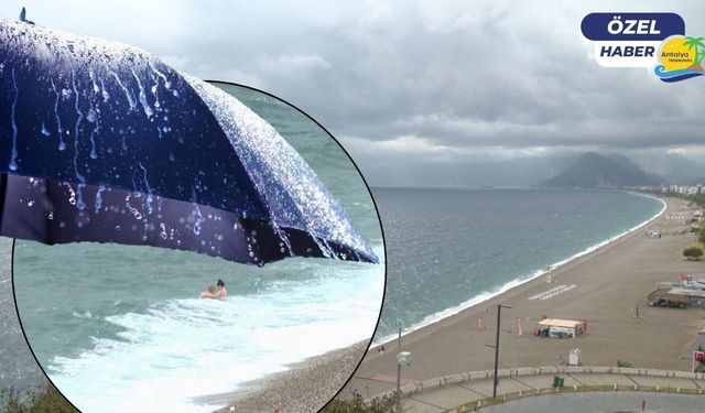 Antalya’da yağmura rağmen denize girenler kamerada