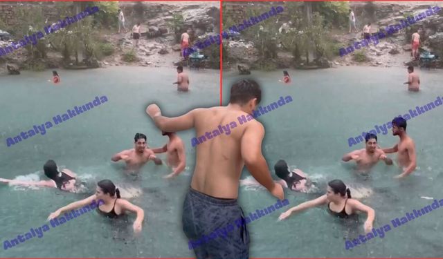 Antalya sıcağından bunalanlar yağmur altında yüzdü!