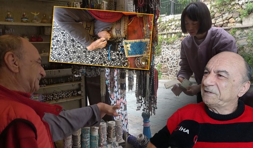 Antalya'da imkansız denileni başardı: Boncuk dizip, direksiyon sallıyor