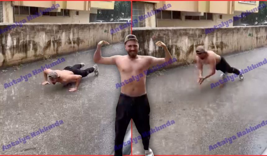 Antalya’da yağmurda çıplak şınav çekti!