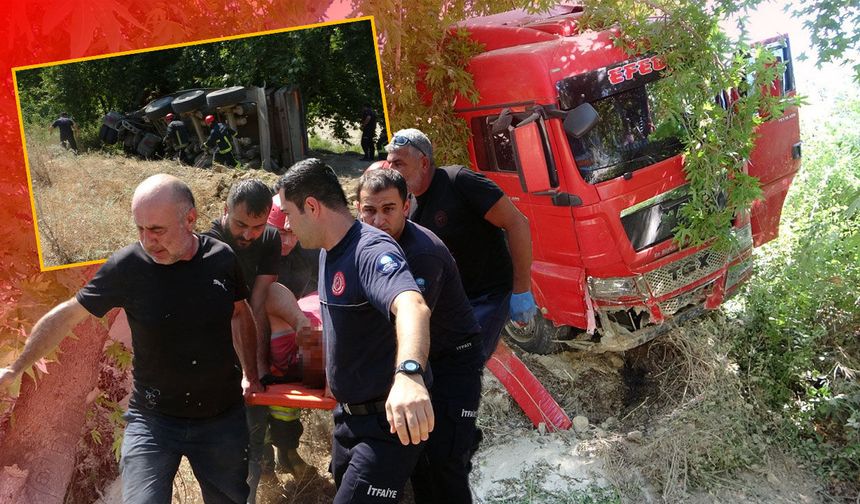 Antalya'da kum yüklü çekici devrildi: Araçta sıkışan sürücü şoka girdi!
