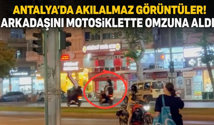 Antalya’da akılalmaz görüntüler: Arkadaşını motosiklette omzuna aldı!