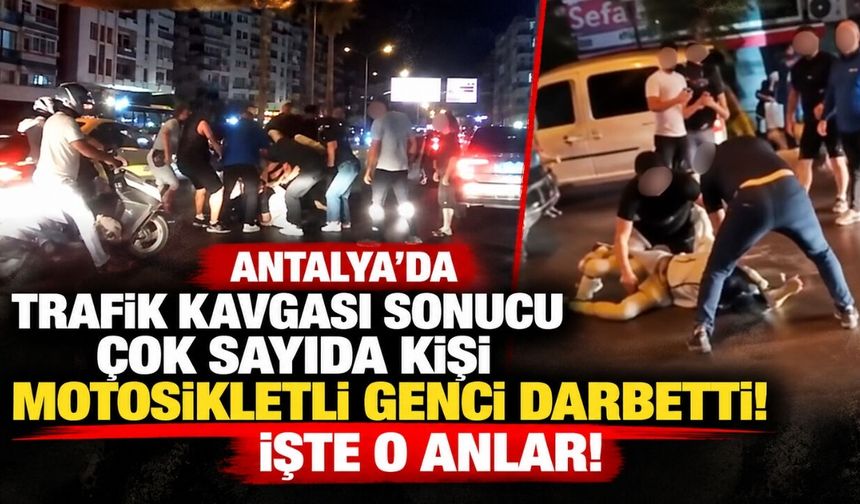 Antalya'da trafik kavgası sonucu çok sayıda kişi motosikletli genci darbetti! İşte o anlar